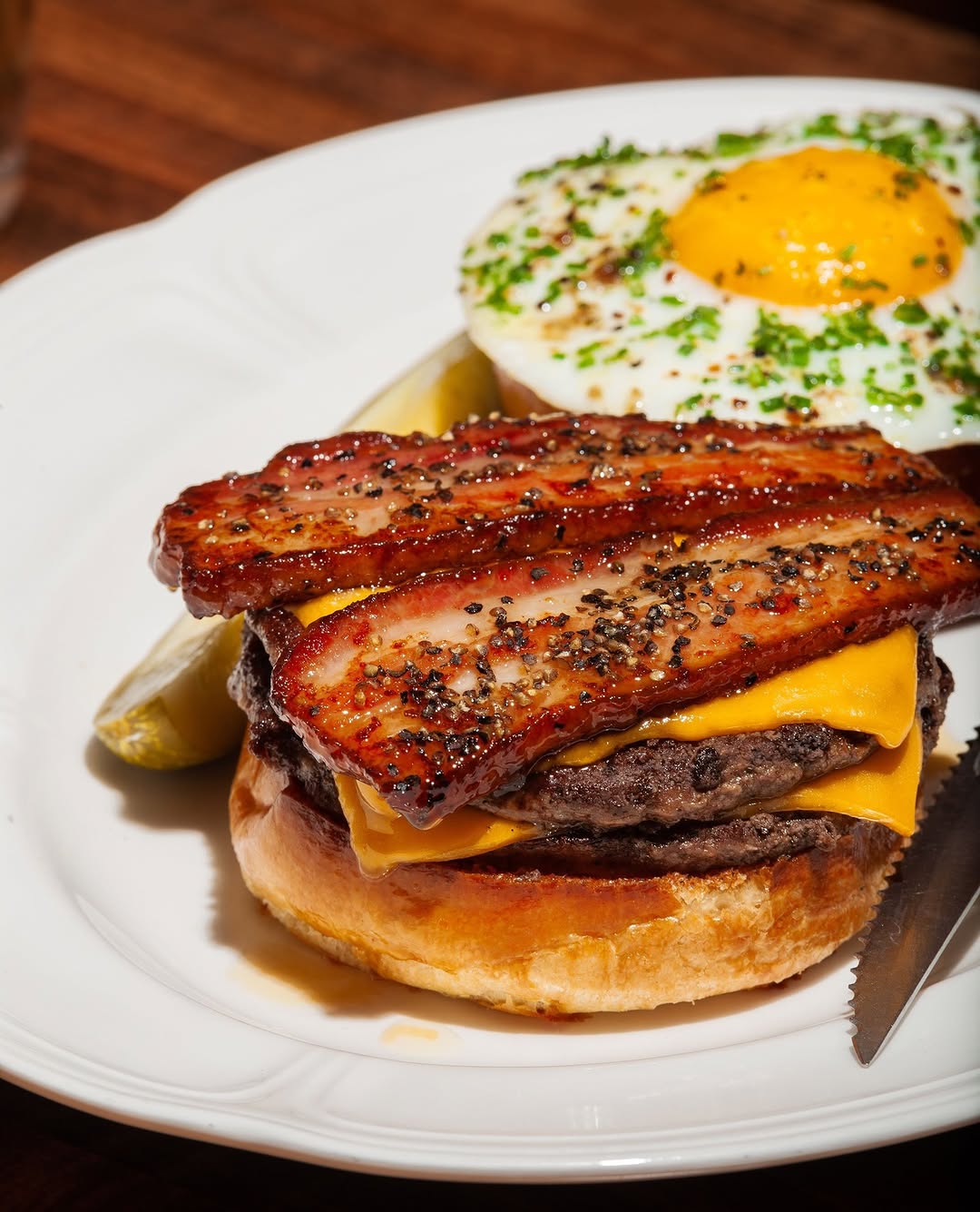 Au Cheval's double cheeseburger with thick-cut bacon and a fried egg